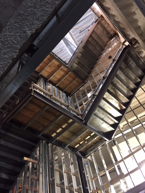 Structural steel stair stringers under construction